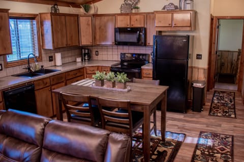 Cozy kitchen is stocked!
Pot & pans, dishes, coffee maker, coffee, sugar, etc...