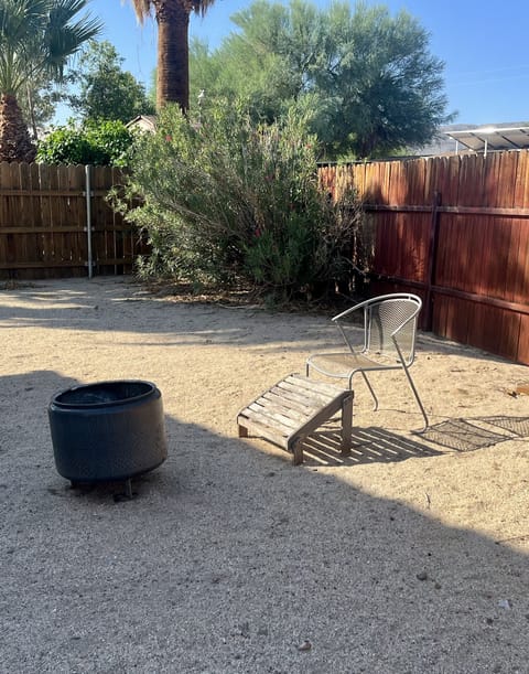 Outdoor yard with fire pit. Perfect for outdoor star gazing.