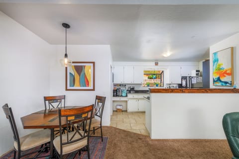 Dining/Kitchen. Coffee bar with Keurig, brew pot, & espresso machine. 