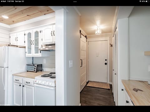 Kitchen and hallway from front entrance.