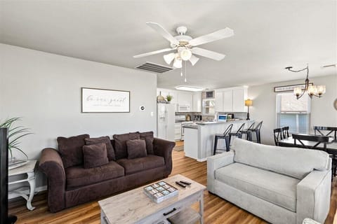 Bright and airy space with inviting furniture and a stunning open layout!