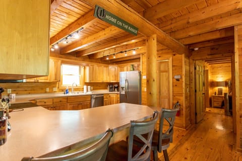 Kitchen with Counter Space and Bar Seating