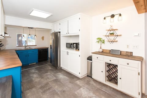 Recently renovated kitchen with wine bar.