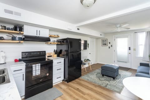 Full-size kitchen with refrigerator, stove/oven, and microwave