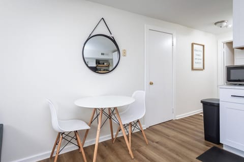 The kitchen features an eat-in dining space plus living space, flat screen TV, and laundry available.