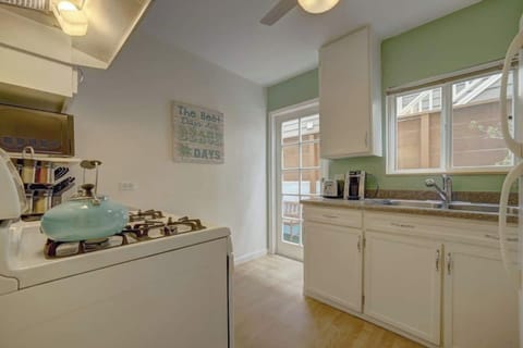 Enjoy your mornings in this brightly lit kitchen. 