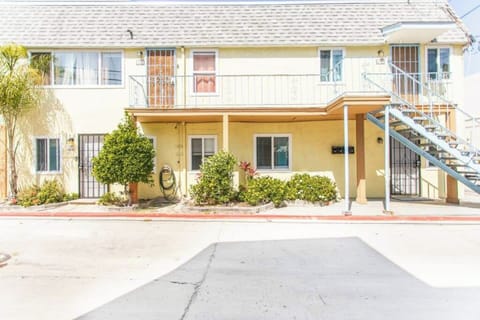 You are the bottom floor, right side of this 4 unit complex with a very large shared roof top patio as well as your own private patio in back. 