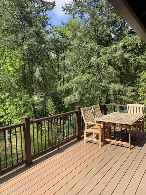 Lovely new deck with dining room table and chairs for al fresco dinners.
