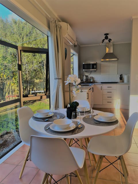 Open plan kitchen and dining. Seats for 6 to dine.