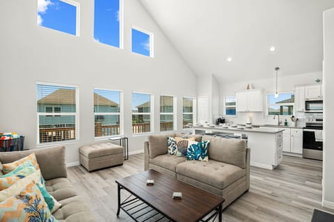 Plenty of windows to enjoy the sun and views in the open kitchen and living room