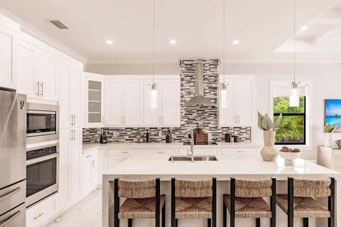 The kitchen is stocked with every amenity you and your guests might need during your stay! | Coastal Sol by Boutiq Luxury Vacation Rentals | Naples, Florida