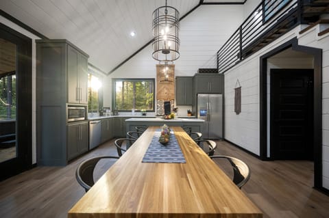 Beautiful custom waterfall table and vent hood