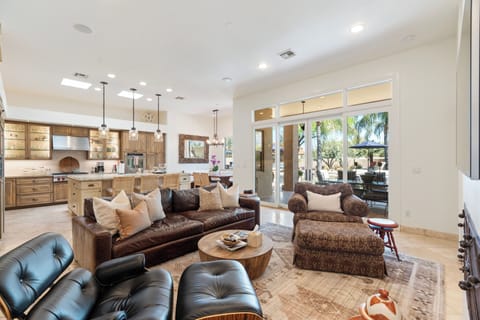 Family Room. Open Pella sliders & enjoy morning coffee in backyard oasis.