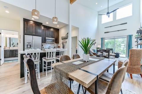 Great Room A with soaring ceilings and tons of natural light - there's a connecting door to Side B which allows you to open the entire house up as one, or keep closed when one side needs privacy.  