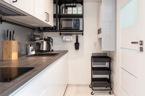 Modern, fully equipped kitchenette.