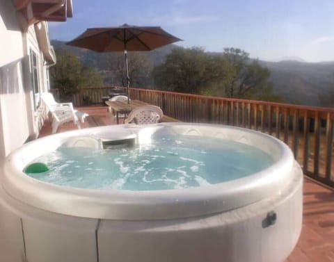 Hot tub with view over valley