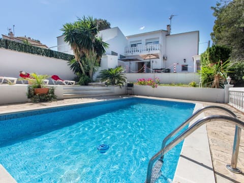 Water, Plant, Sky, Property, Building, Swimming Pool, Azure, Tree, Outdoor Furniture, Shade