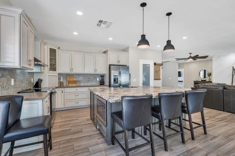 Chief kitchen well stocked. This will be the gathering area in the home.