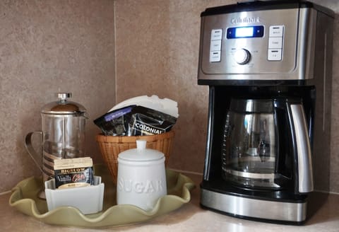 Coffee, tea, sugar, drip machine and french press available.