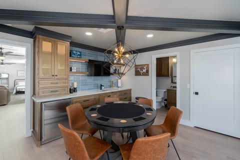 Poker table (reversible) & bar, located off Bedroom 7/Game Room, has full bath - plus top balcony lake view!