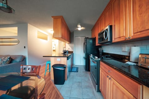 Equipped kitchen with full size refrigerator, dish washer, appliances