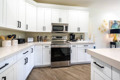 A bright kitchen ready for family meals and morning coffee.