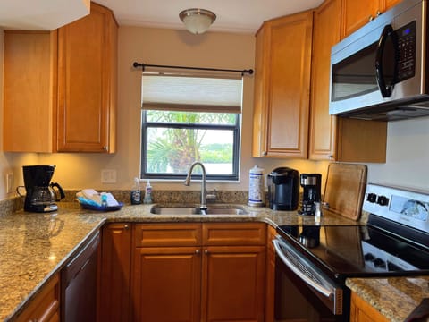 Three different coffee options including a traditional coffee pot and a Keurig. 