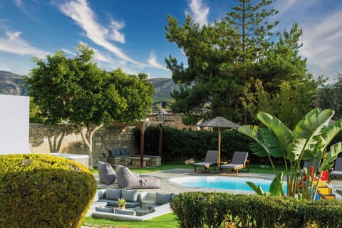 An iconic lounge setting, next to the pool and Spa Whirlpool