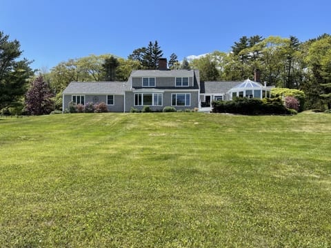 Photo of the main house with sprawling lawn
