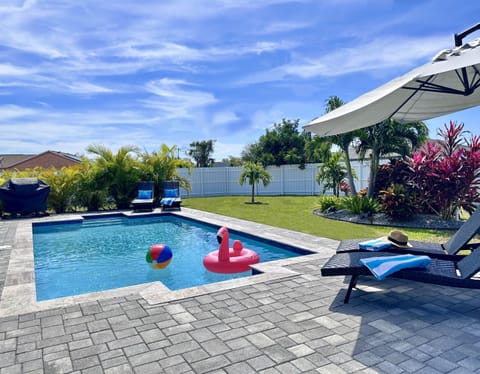 Sun-kissed, south facing, salt water pool, and oversized private fenced back yard!
