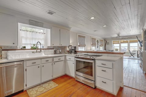 Vintage sink, electric range with airfryer, dishwasher, frig with dual ice maker