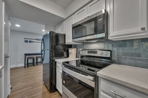 Kitchen has full size fridge, slow cooker, air fryer and blender.  