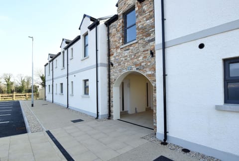 3 Bedroom apartment is to the left of the archway 