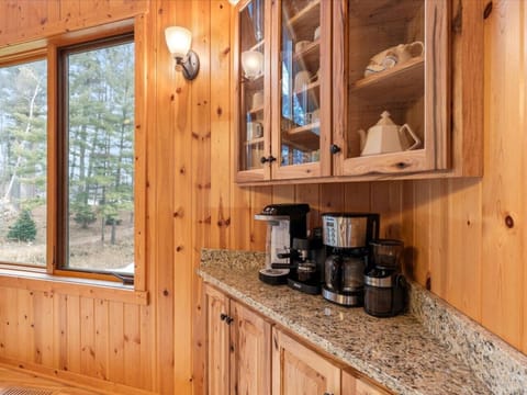 Dedicated drink station offering premium coffee facilities for guest use.