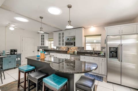 Updated Kitchen with Stainless Steel Appliances, Island and Coffee Bar