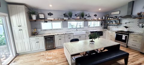 Pot Filler+mini fridge+small appliances+serving dishes+lots of pans+eextras