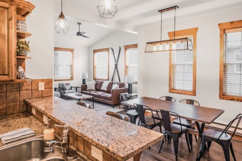 Kitchen, dining, and open living room are perfect for a large family or friends!