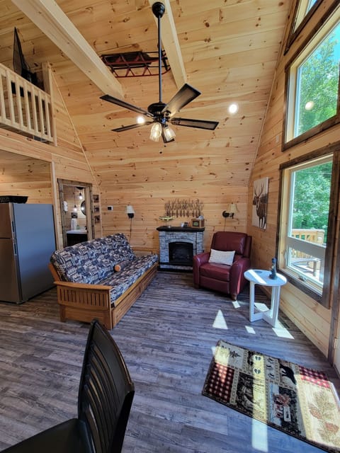 Futon, recliner and electric fireplace