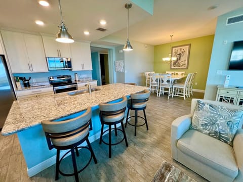 Kitchen and dining areas with current decor. 
