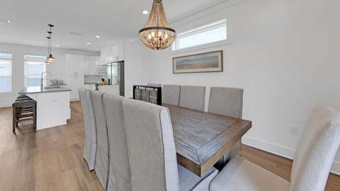 Second Floor Dining Area With Seating For Ten At Table, Four Seats At Bar And Three Seats At Desk Area In Kitchen