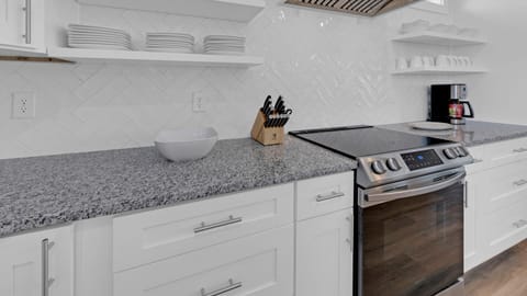 Kitchen Has Open Shelving and Upgraded Vent