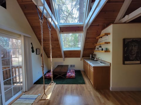 With a coffee/wine bar, swing, lounge seating, guitar, board games & more..