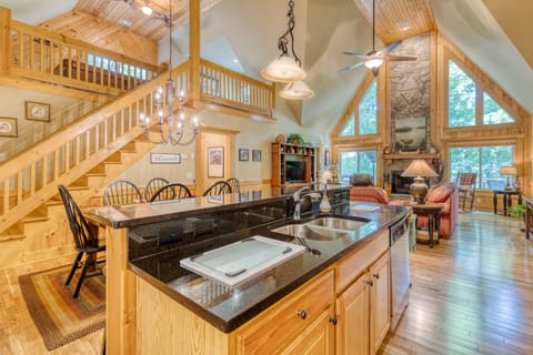 The stairs pictures lead to the loft with the pool table.