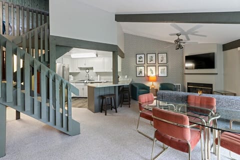 Open concept living and dinning area with island seating