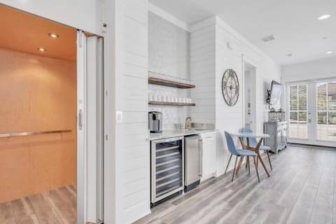 Welcoming entry hallway w/ sleek finishes & a light, open feel.
