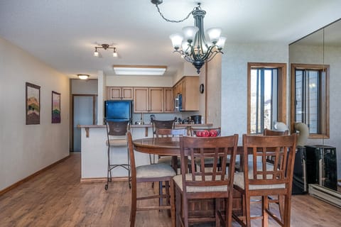 Enjoy a meal with friends in the dining room | Main Level