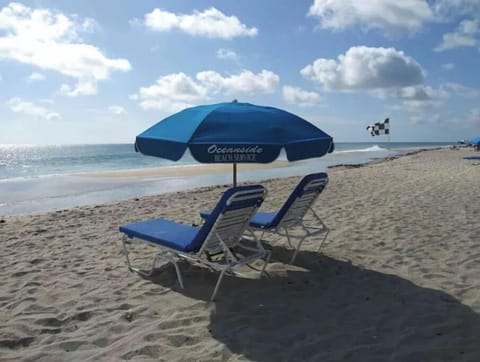 FREE - 2 Beach chairs and umbrella included with your stay!