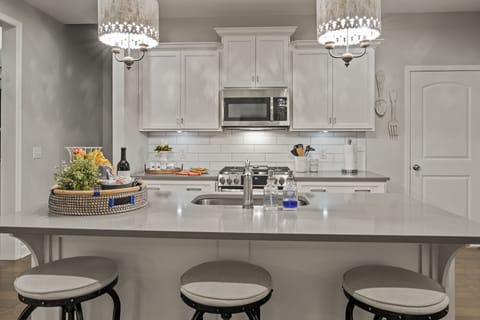 Gas cooktop,  full-size island & seating for 3-great for the kiddos.