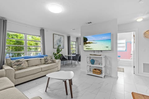 Living room with 58 inch smart TV.