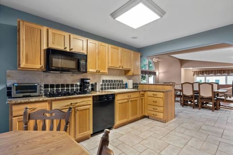 Fully stocked kitchen and two dining areas ensures family dinners are a breeze!